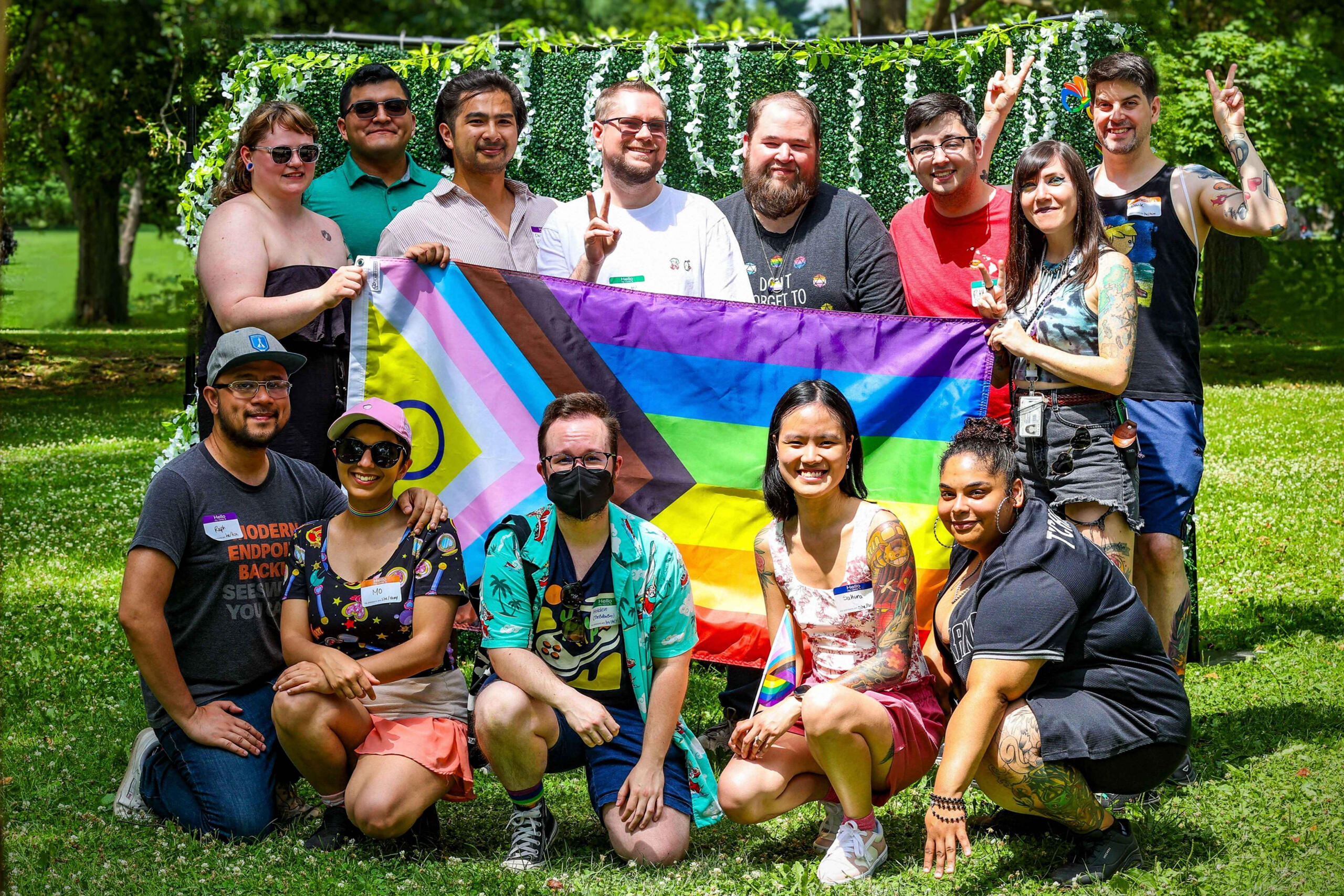 Team meet up holding the progressive flag